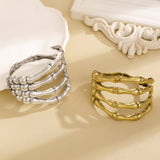 Bracelet rétro en forme de patte de crâne ajourée pour femme