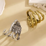 Bracelet rétro en forme de patte de crâne ajourée pour femme