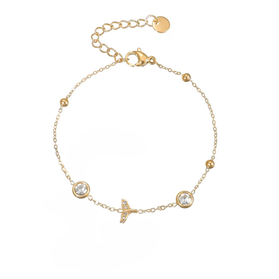 Un nouveau bracelet élégant en acier inoxydable au toucher luxueux, orné de motifs papillon, cœur, couronne et trèfle. Cette pièce unique et tendance constitue un cadeau idéal pour la famille, en particulier pour le Nouvel An.